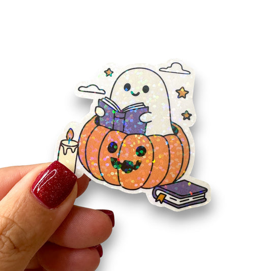 Ghost Reading In A Pumpkin Die Cut Holographic Sticker