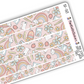 Close up view of pink school supplies themed washi strip sticker sheet with 5 stickers, with rainbow, paper, pencils, and backpack artwork on a pink background.